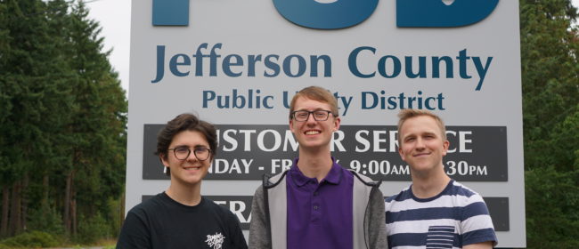 New Interns and Customer Service Representatives Posing Infront of PUD sign