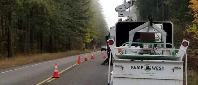 Contract crews trimming trees and shrubbery along Old Gardiner Road