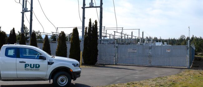 White PUD truck parked in front of the PUD's Chimacum Substation