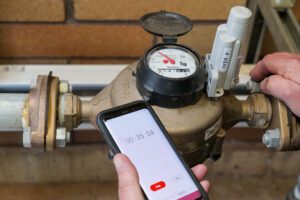 PUD Water Distribution Manager II, Doug Reeder, calculates pump flow rates for testing.