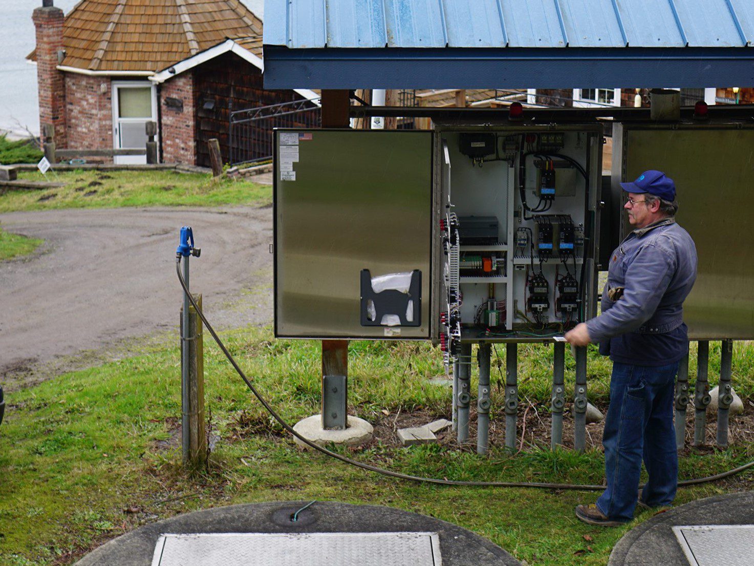 PUD employee working with a wastewater terminal
