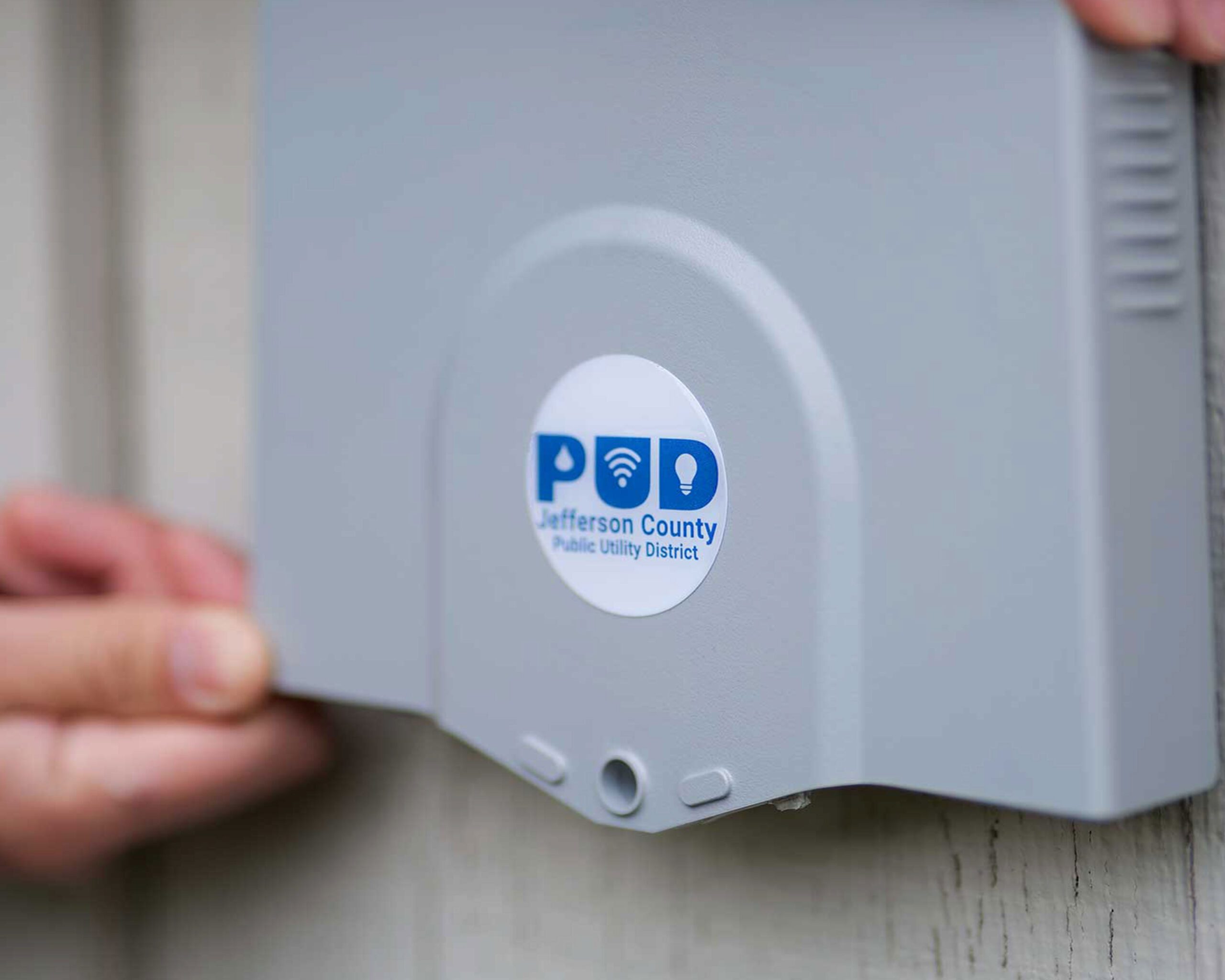 close up of NID box being installed