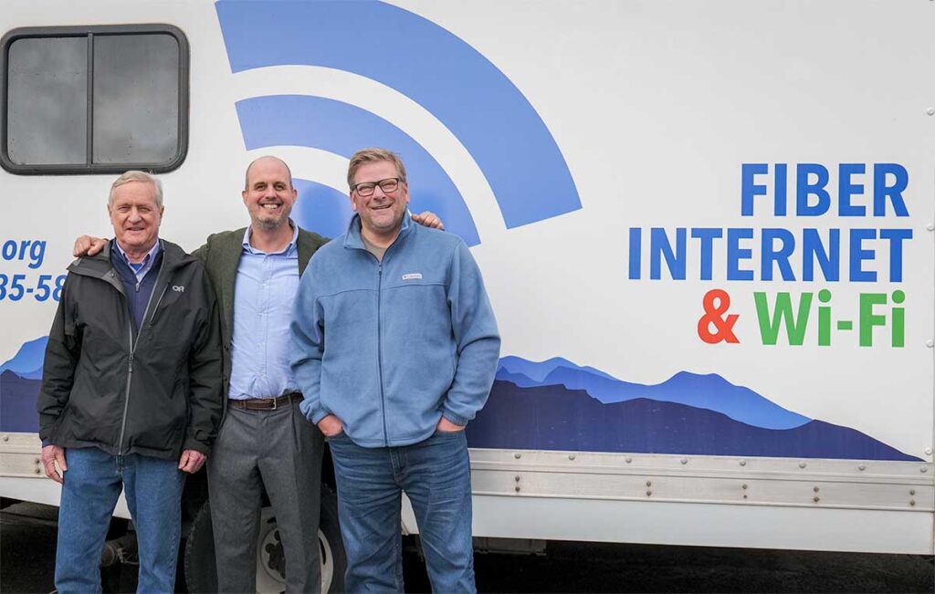 Legislators in front of JPUD broadband fiber splicing truck