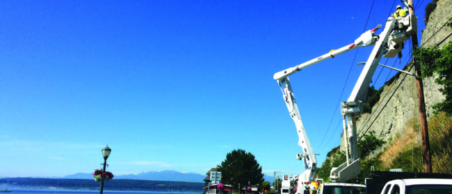 PUD working on power pole on Water Street