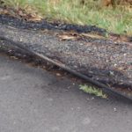 Wire burnt asphault on Center Valley Road.
