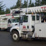Michels trucks parked to assist in restoration