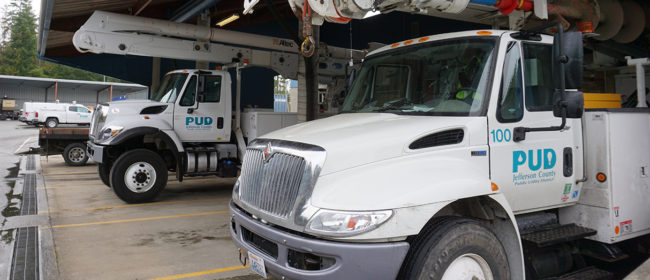 PUD trucks lined parked near eachother