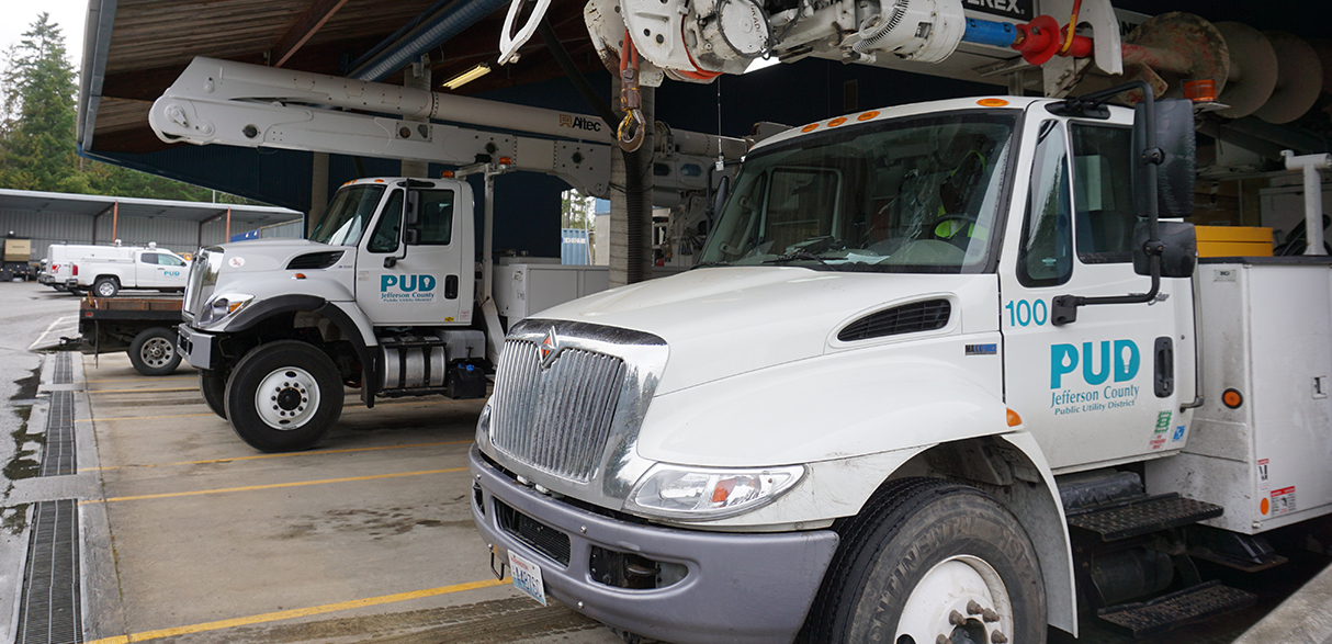 PUD trucks lined parked near eachother